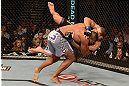 LAS VEGAS, NV - FEBRUARY 02:  Alistair Overeem (gray shorts) takes down Antonio Silva during their heavyweight fight at UFC 156 on February 2, 2013 at the Mandalay Bay Events Center in Las Vegas, Nevada.  (Photo by Donald Miralle/Zuffa LLC/Zuffa LLC via Getty Images) *** Local Caption *** Alistair Overeem; Antonio Silva