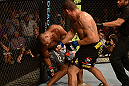 LAS VEGAS, NV - FEBRUARY 02:  (R-L) Antonio Silva punches Alistair Overeem during their heavyweight fight at UFC 156 on February 2, 2013 at the Mandalay Bay Events Center in Las Vegas, Nevada.  (Photo by Donald Miralle/Zuffa LLC/Zuffa LLC via Getty Images) *** Local Caption *** Alistair Overeem; Antonio Silva
