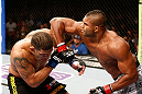 LAS VEGAS, NV - FEBRUARY 02:  (R-L) Alistair Overeem elbows Antonio Silva during their heavyweight fight at UFC 156 on February 2, 2013 at the Mandalay Bay Events Center in Las Vegas, Nevada.  (Photo by Josh Hedges/Zuffa LLC/Zuffa LLC via Getty Images) *** Local Caption *** Alistair Overeem; Antonio Silva
