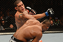 LAS VEGAS, NV - FEBRUARY 02:  Antonio Silva (top) punches Alistair Overeem during their heavyweight fight at UFC 156 on February 2, 2013 at the Mandalay Bay Events Center in Las Vegas, Nevada.  (Photo by Donald Miralle/Zuffa LLC/Zuffa LLC via Getty Images) *** Local Caption *** Alistair Overeem; Antonio Silva