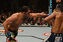 LAS VEGAS, NV - FEBRUARY 02:  Antonio Rogerio Nogueira (left) punches Rashad Evans during their light heavyweight fight at UFC 156 on February 2, 2013 at the Mandalay Bay Events Center in Las Vegas, Nevada.  (Photo by Donald Miralle/Zuffa LLC/Zuffa LLC via Getty Images) *** Local Caption *** Rashad Evans; Antonio Rogerio Nogueira