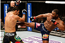 LAS VEGAS, NV - FEBRUARY 02:  (R-L) Rashad Evans kicks Antonio Rogerio Nogueira during their light heavyweight fight at UFC 156 on February 2, 2013 at the Mandalay Bay Events Center in Las Vegas, Nevada.  (Photo by Josh Hedges/Zuffa LLC/Zuffa LLC via Getty Images) *** Local Caption *** Rashad Evans; Antonio Rogerio Nogueira