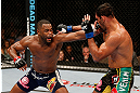 LAS VEGAS, NV - FEBRUARY 02:  (L-R) Rashad Evans punches Antonio Rogerio Nogueira during their light heavyweight fight at UFC 156 on February 2, 2013 at the Mandalay Bay Events Center in Las Vegas, Nevada.  (Photo by Donald Miralle/Zuffa LLC/Zuffa LLC via Getty Images) *** Local Caption *** Rashad Evans; Antonio Rogerio Nogueira
