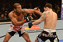 LAS VEGAS, NV - FEBRUARY 02:  (L-R) Jose Aldo punches Frankie Edgar during their featherweight title fight at UFC 156 on February 2, 2013 at the Mandalay Bay Events Center in Las Vegas, Nevada.  (Photo by Donald Miralle/Zuffa LLC/Zuffa LLC via Getty Images) *** Local Caption *** Jose Aldo; Frankie Edgar