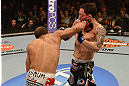 LAS VEGAS, NV - FEBRUARY 02:  (L-R) Jose Aldo punches Frankie Edgar during their featherweight title fight at UFC 156 on February 2, 2013 at the Mandalay Bay Events Center in Las Vegas, Nevada.  (Photo by Donald Miralle/Zuffa LLC/Zuffa LLC via Getty Images) *** Local Caption *** Jose Aldo; Frankie Edgar