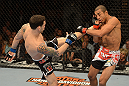 LAS VEGAS, NV - FEBRUARY 02:  (L-R) Frankie Edgar kicks Jose Aldo during their featherweight title fight at UFC 156 on February 2, 2013 at the Mandalay Bay Events Center in Las Vegas, Nevada.  (Photo by Donald Miralle/Zuffa LLC/Zuffa LLC via Getty Images) *** Local Caption *** Jose Aldo; Frankie Edgar