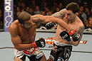 LAS VEGAS, NV - FEBRUARY 02:  (L-R) Jose Aldo punches Frankie Edgar during their featherweight title fight at UFC 156 on February 2, 2013 at the Mandalay Bay Events Center in Las Vegas, Nevada.  (Photo by Donald Miralle/Zuffa LLC/Zuffa LLC via Getty Images) *** Local Caption *** Jose Aldo; Frankie Edgar