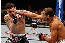 LAS VEGAS, NV - FEBRUARY 02:  (R-L) Jose Aldo punches Frankie Edgar during their featherweight title fight at UFC 156 on February 2, 2013 at the Mandalay Bay Events Center in Las Vegas, Nevada.  (Photo by Josh Hedges/Zuffa LLC/Zuffa LLC via Getty Images) *** Local Caption *** Jose Aldo; Frankie Edgar