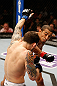 LAS VEGAS, NV - FEBRUARY 02:  Jose Aldo (right) punches Frankie Edgar during their featherweight title fight at UFC 156 on February 2, 2013 at the Mandalay Bay Events Center in Las Vegas, Nevada.  (Photo by Josh Hedges/Zuffa LLC/Zuffa LLC via Getty Images) *** Local Caption *** Jose Aldo; Frankie Edgar
