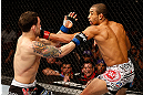 LAS VEGAS, NV - FEBRUARY 02:  (R-L) Jose Aldo punches Frankie Edgar during their featherweight title fight at UFC 156 on February 2, 2013 at the Mandalay Bay Events Center in Las Vegas, Nevada.  (Photo by Josh Hedges/Zuffa LLC/Zuffa LLC via Getty Images) *** Local Caption *** Jose Aldo; Frankie Edgar