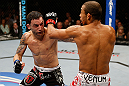 LAS VEGAS, NV - FEBRUARY 02:  (L-R) Frankie Edgar punches Jose Aldo during their featherweight title fight at UFC 156 on February 2, 2013 at the Mandalay Bay Events Center in Las Vegas, Nevada.  (Photo by Josh Hedges/Zuffa LLC/Zuffa LLC via Getty Images) *** Local Caption *** Jose Aldo; Frankie Edgar