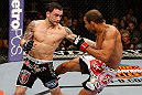 LAS VEGAS, NV - FEBRUARY 02:  (L-R) Frankie Edgar punches Jose Aldo during their featherweight title fight at UFC 156 on February 2, 2013 at the Mandalay Bay Events Center in Las Vegas, Nevada.  (Photo by Josh Hedges/Zuffa LLC/Zuffa LLC via Getty Images) *** Local Caption *** Jose Aldo; Frankie Edgar