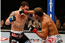LAS VEGAS, NV - FEBRUARY 02:  (R-L) Jose Aldo punches Frankie Edgar during their featherweight title fight at UFC 156 on February 2, 2013 at the Mandalay Bay Events Center in Las Vegas, Nevada.  (Photo by Josh Hedges/Zuffa LLC/Zuffa LLC via Getty Images) *** Local Caption *** Jose Aldo; Frankie Edgar