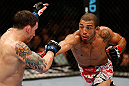 LAS VEGAS, NV - FEBRUARY 02:  (R-L) Jose Aldo punches Frankie Edgar during their featherweight title fight at UFC 156 on February 2, 2013 at the Mandalay Bay Events Center in Las Vegas, Nevada.  (Photo by Josh Hedges/Zuffa LLC/Zuffa LLC via Getty Images) *** Local Caption *** Jose Aldo; Frankie Edgar