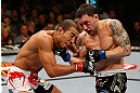LAS VEGAS, NV - FEBRUARY 02:  (R-L) Frankie Edgar punches Jose Aldo during their featherweight title fight at UFC 156 on February 2, 2013 at the Mandalay Bay Events Center in Las Vegas, Nevada.  (Photo by Josh Hedges/Zuffa LLC/Zuffa LLC via Getty Images) *** Local Caption *** Jose Aldo; Frankie Edgar