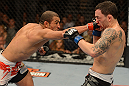 LAS VEGAS, NV - FEBRUARY 02:  (L-R) Jose Aldo punches Frankie Edgar during their featherweight title fight at UFC 156 on February 2, 2013 at the Mandalay Bay Events Center in Las Vegas, Nevada.  (Photo by Donald Miralle/Zuffa LLC/Zuffa LLC via Getty Images) *** Local Caption *** Jose Aldo; Frankie Edgar