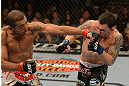 LAS VEGAS, NV - FEBRUARY 02:  (L-R) Jose Aldo punches Frankie Edgar during their featherweight title fight at UFC 156 on February 2, 2013 at the Mandalay Bay Events Center in Las Vegas, Nevada.  (Photo by Donald Miralle/Zuffa LLC/Zuffa LLC via Getty Images) *** Local Caption *** Jose Aldo; Frankie Edgar