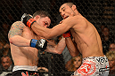 LAS VEGAS, NV - FEBRUARY 02:  (L-R) Frankie Edgar punches Jose Aldo during their featherweight title fight at UFC 156 on February 2, 2013 at the Mandalay Bay Events Center in Las Vegas, Nevada.  (Photo by Donald Miralle/Zuffa LLC/Zuffa LLC via Getty Images) *** Local Caption *** Jose Aldo; Frankie Edgar