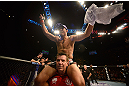 LAS VEGAS, NV - FEBRUARY 02:  Jose Aldo reacts to his victory over Frankie Edgar after their featherweight title fight at UFC 156 on February 2, 2013 at the Mandalay Bay Events Center in Las Vegas, Nevada.  (Photo by Josh Hedges/Zuffa LLC/Zuffa LLC via Getty Images) *** Local Caption *** Jose Aldo; Frankie Edgar