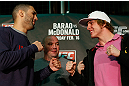 LONDON, ENGLAND - FEBRUARY 13:  (L-R) Opponents Che Mills and Matthew Riddle face off during a UFC press conference on February 13, 2013 at Hooks Gym in London, England.  (Photo by Josh Hedges/Zuffa LLC/Zuffa LLC via Getty Images)
