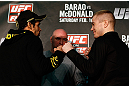 LONDON, ENGLAND - FEBRUARY 13:  (L-R) Opponents Renan Barao and Michael McDonald face off during a UFC press conference on February 13, 2013 at Hooks Gym in London, England.  (Photo by Josh Hedges/Zuffa LLC/Zuffa LLC via Getty Images)