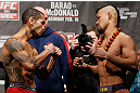 LONDON, ENGLAND - FEBRUARY 15:  (L-R) Opponents Vaughan Lee and Motonobu Tezuka face off during the UFC weigh-in on February 15, 2013 at Wembley Arena in London, England.  (Photo by Josh Hedges/Zuffa LLC/Zuffa LLC via Getty Images)