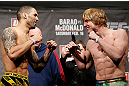LONDON, ENGLAND - FEBRUARY 15:  (L-R) Opponents Che Mills and Matthew Riddle face off during the UFC weigh-in on February 15, 2013 at Wembley Arena in London, England.  (Photo by Josh Hedges/Zuffa LLC/Zuffa LLC via Getty Images)