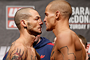 LONDON, ENGLAND - FEBRUARY 15:  (L-R) Opponents Cub Swanson and Dustin Poirier face off during the UFC weigh-in on February 15, 2013 at Wembley Arena in London, England.  (Photo by Josh Hedges/Zuffa LLC/Zuffa LLC via Getty Images)