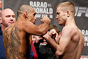 LONDON, ENGLAND - FEBRUARY 15:  (L-R) Opponents Renan Baraoand Michael McDonald face off during the UFC weigh-in on February 15, 2013 at Wembley Arena in London, England.  (Photo by Josh Hedges/Zuffa LLC/Zuffa LLC via Getty Images)