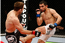 LONDON, ENGLAND - FEBRUARY 16:  (R-L) Ulysses Gomez kicks Phil Harris in their flyweight fight during the UFC on Fuel TV event on February 16, 2013 at Wembley Arena in London, England.  (Photo by Josh Hedges/Zuffa LLC/Zuffa LLC via Getty Images)