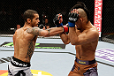 LONDON, ENGLAND - FEBRUARY 16:  (L-R) Vaughan Lee punches Motonobu Tezuka in their bantamweight fight during the UFC on Fuel TV event on February 16, 2013 at Wembley Arena in London, England.  (Photo by Josh Hedges/Zuffa LLC/Zuffa LLC via Getty Images)