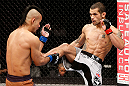 LONDON, ENGLAND - FEBRUARY 16:  (R-L) Vaughan Lee kicks Motonobu Tezuka in their bantamweight fight during the UFC on Fuel TV event on February 16, 2013 at Wembley Arena in London, England.  (Photo by Josh Hedges/Zuffa LLC/Zuffa LLC via Getty Images)
