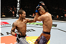 LONDON, ENGLAND - FEBRUARY 16:  (L-R) Vaughan Lee punches Motonobu Tezuka in their bantamweight fight during the UFC on Fuel TV event on February 16, 2013 at Wembley Arena in London, England.  (Photo by Josh Hedges/Zuffa LLC/Zuffa LLC via Getty Images)