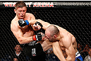 LONDON, ENGLAND - FEBRUARY 16:  (R-L) Stanislav Nedkov punches Tom Watson in their middleweight fight during the UFC on Fuel TV event on February 16, 2013 at Wembley Arena in London, England.  (Photo by Josh Hedges/Zuffa LLC/Zuffa LLC via Getty Images)
