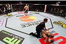 LONDON, ENGLAND - FEBRUARY 16:   (L-R) Tom Watson reacts after defeating Stanislav Nedkov in their middleweight fight during the UFC on Fuel TV event on February 16, 2013 at Wembley Arena in London, England.  (Photo by Josh Hedges/Zuffa LLC/Zuffa LLC via Getty Images)