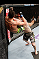 LONDON, ENGLAND - FEBRUARY 16:  (R-L) Andy Ogle slams Josh Grispi in their featherweight fight during the UFC on Fuel TV event on February 16, 2013 at Wembley Arena in London, England.  (Photo by Josh Hedges/Zuffa LLC/Zuffa LLC via Getty Images)