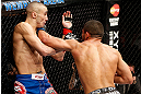 LONDON, ENGLAND - FEBRUARY 16:  (R-L) Renee Forte punches Terry Etim in their lightweight fight during the UFC on Fuel TV event on February 16, 2013 at Wembley Arena in London, England.  (Photo by Josh Hedges/Zuffa LLC/Zuffa LLC via Getty Images)