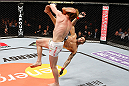 LONDON, ENGLAND - FEBRUARY 16:  (R-L) Che Mills kicks Matthew Riddle after a takedown in their welterweight fight during the UFC on Fuel TV event on February 16, 2013 at Wembley Arena in London, England.  (Photo by Josh Hedges/Zuffa LLC/Zuffa LLC via Getty Images)