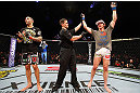 LONDON, ENGLAND - FEBRUARY 16:  Matthew Riddle (R) reacts after defeating Che Mills (L) in their welterweight fight during the UFC on Fuel TV event on February 16, 2013 at Wembley Arena in London, England.  (Photo by Josh Hedges/Zuffa LLC/Zuffa LLC via Getty Images)