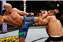 LONDON, ENGLAND - FEBRUARY 16:  (L-R) Ryan Jimmo kicks James Te Huna in their light heavyweight fight during the UFC on Fuel TV event on February 16, 2013 at Wembley Arena in London, England.  (Photo by Josh Hedges/Zuffa LLC/Zuffa LLC via Getty Images)