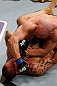 LONDON, ENGLAND - FEBRUARY 16:  (R-L) Ryan Jimmo punches James Te Huna in their light heavyweight fight during the UFC on Fuel TV event on February 16, 2013 at Wembley Arena in London, England.  (Photo by Josh Hedges/Zuffa LLC/Zuffa LLC via Getty Images)