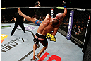 LONDON, ENGLAND - FEBRUARY 16:  (L-R) James Te Huna takes down Ryan Jimmo in their light heavyweight fight during the UFC on Fuel TV event on February 16, 2013 at Wembley Arena in London, England.  (Photo by Josh Hedges/Zuffa LLC/Zuffa LLC via Getty Images)