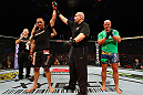 LONDON, ENGLAND - FEBRUARY 16:  James Te Huna (L) reacts after defeating Ryan Jimmo (R) in their light heavyweight fight during the UFC on Fuel TV event on February 16, 2013 at Wembley Arena in London, England.  (Photo by Josh Hedges/Zuffa LLC/Zuffa LLC via Getty Images)