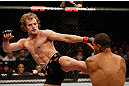 LONDON, ENGLAND - FEBRUARY 16:  (L-R) Gunnar Nelson kicks Jorge Santiago in their welterweight fight during the UFC on Fuel TV event on February 16, 2013 at Wembley Arena in London, England.  (Photo by Josh Hedges/Zuffa LLC/Zuffa LLC via Getty Images)