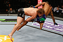 LONDON, ENGLAND - FEBRUARY 16:  (L-R) Gunnar Nelson takes down Jorge Santiago in their welterweight fight during the UFC on Fuel TV event on February 16, 2013 at Wembley Arena in London, England.  (Photo by Josh Hedges/Zuffa LLC/Zuffa LLC via Getty Images)