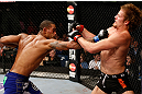 LONDON, ENGLAND - FEBRUARY 16:  (L-R) Jorge Santiago punches Gunnar Nelson in their welterweight fight during the UFC on Fuel TV event on February 16, 2013 at Wembley Arena in London, England.  (Photo by Josh Hedges/Zuffa LLC/Zuffa LLC via Getty Images)