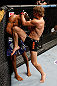 LONDON, ENGLAND - FEBRUARY 16:  (R-L) Gunnar Nelson knees Jorge Santiago in their welterweight fight during the UFC on Fuel TV event on February 16, 2013 at Wembley Arena in London, England.  (Photo by Josh Hedges/Zuffa LLC/Zuffa LLC via Getty Images)