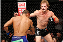 LONDON, ENGLAND - FEBRUARY 16:  (R-L) Gunnar Nelson punches Jorge Santiago in their welterweight fight during the UFC on Fuel TV event on February 16, 2013 at Wembley Arena in London, England.  (Photo by Josh Hedges/Zuffa LLC/Zuffa LLC via Getty Images)