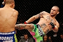 LONDON, ENGLAND - FEBRUARY 16:  (R-L) Cub Swanson kicks Dustin Poirier in their featherweight fight during the UFC on Fuel TV event on February 16, 2013 at Wembley Arena in London, England.  (Photo by Josh Hedges/Zuffa LLC/Zuffa LLC via Getty Images)