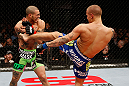 LONDON, ENGLAND - FEBRUARY 16:  (R-L) Dustin Poirier kicks Cub Swanson in their featherweight fight during the UFC on Fuel TV event on February 16, 2013 at Wembley Arena in London, England.  (Photo by Josh Hedges/Zuffa LLC/Zuffa LLC via Getty Images)